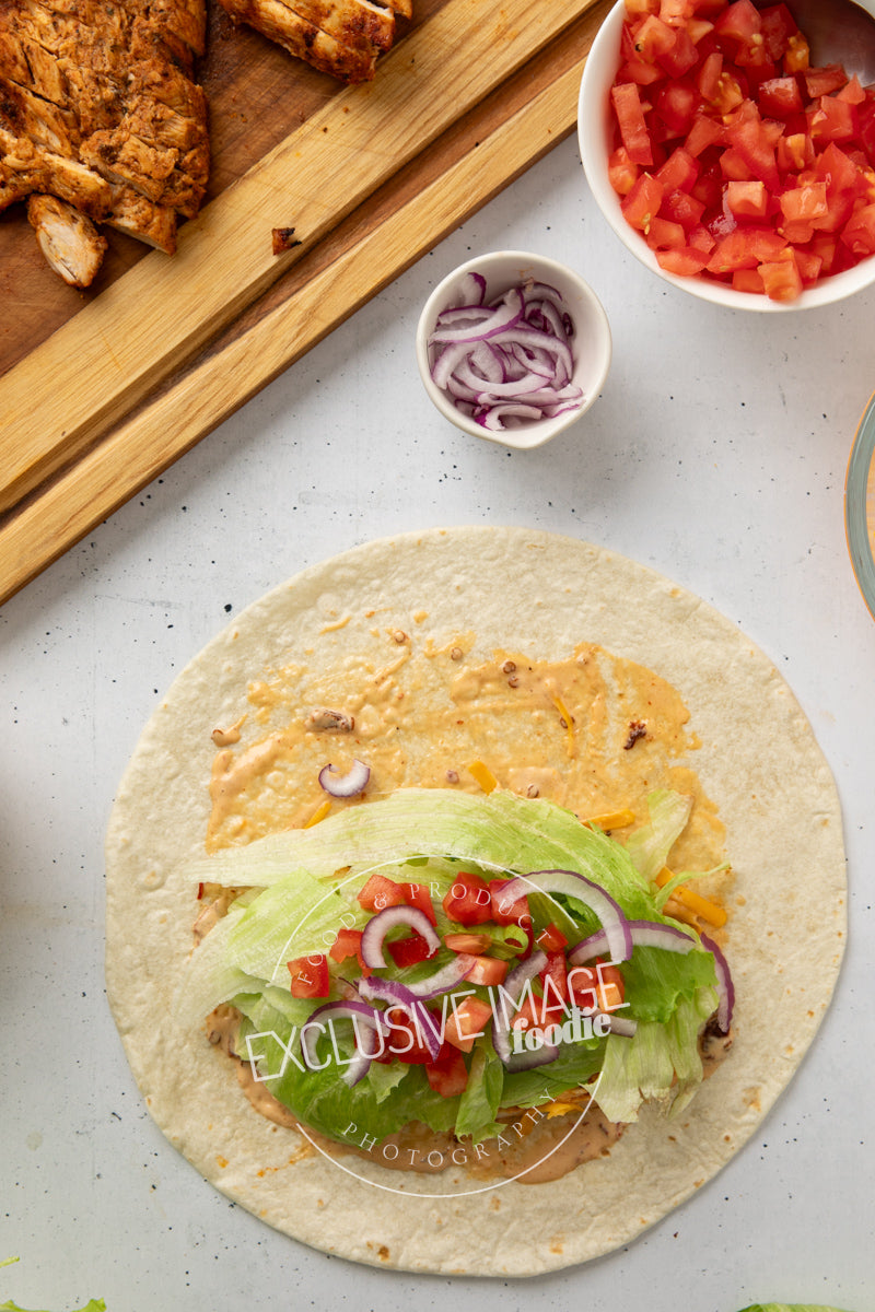 Grilled chicken wrap recipe assembly flat lay process photography food blog