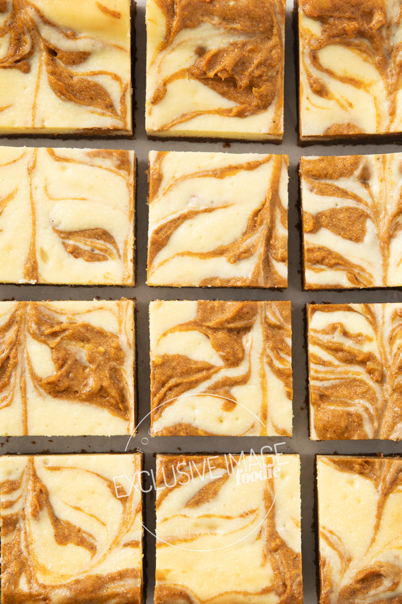 Pumpkin cheesecake bars recipe flat lay hero exclusive recipe photography
