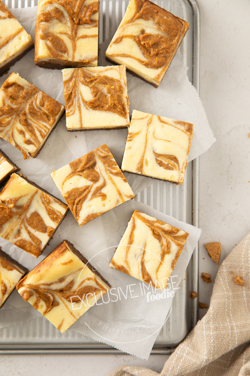 Pumpkin cheesecake bars recipe flat lay hero exclusive recipe photography
