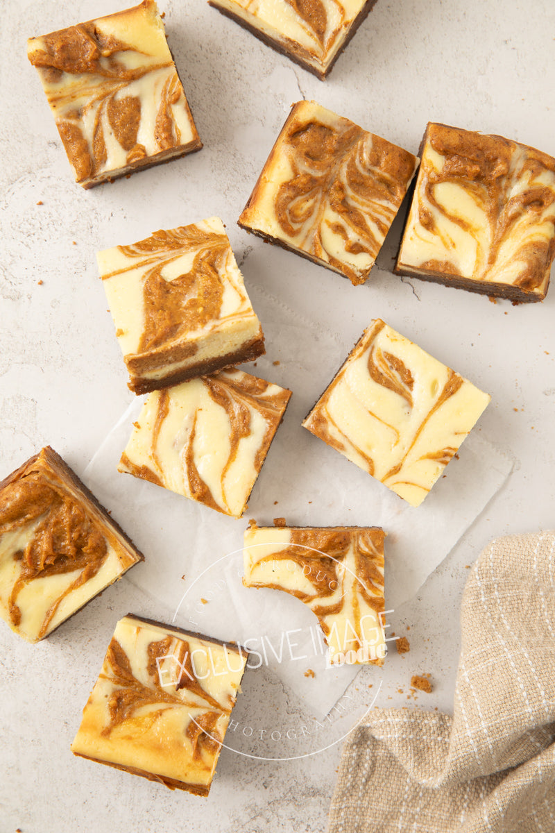 Pumpkin cheesecake bars recipe flat lay hero exclusive recipe photography
